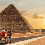 Horse and cart rides up to the Great Pyramids as the sunsets.